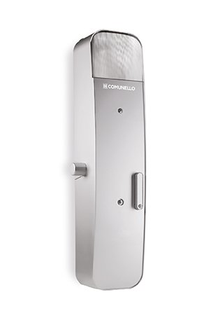 Slim silver vertical surface-mount electric motor for swing gate automation.