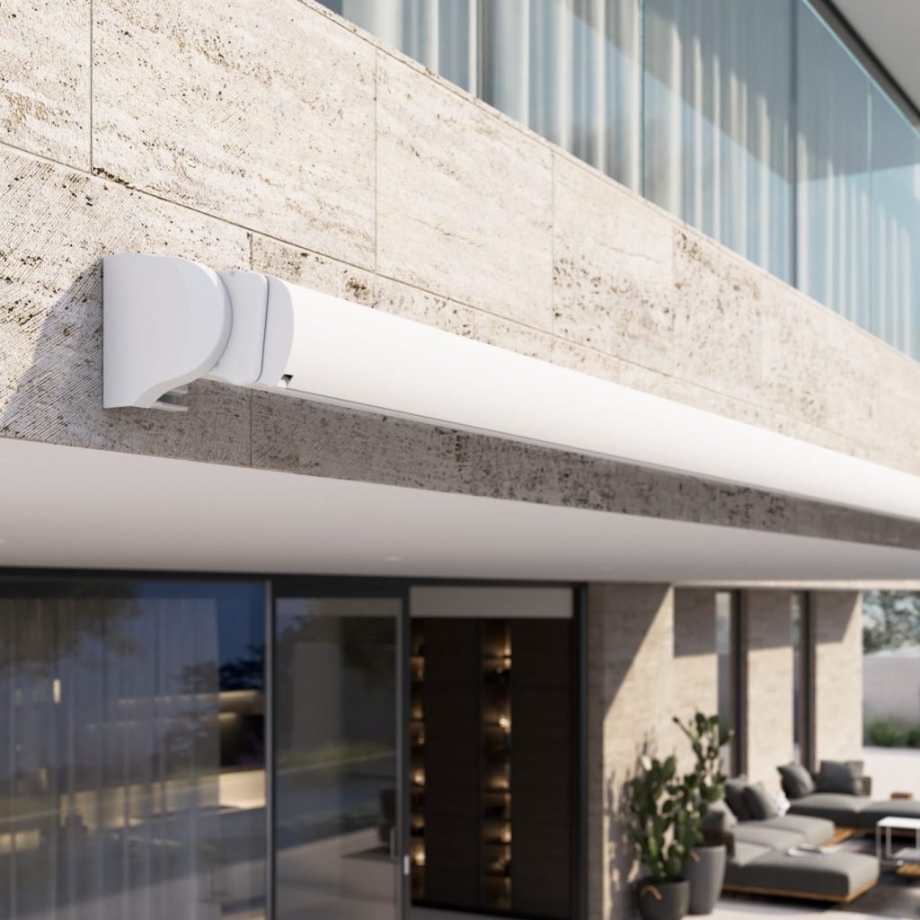 Retractable wall-mounted fabric canopy for patio sun protection