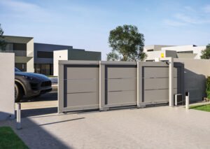 Automated telescopic sliding gate with multiple gray panels installed on a modern driveway.